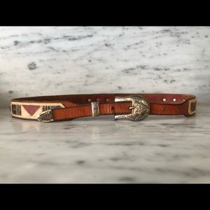 Hand painted with real vintage buffalo nickels.  Measures 40”.